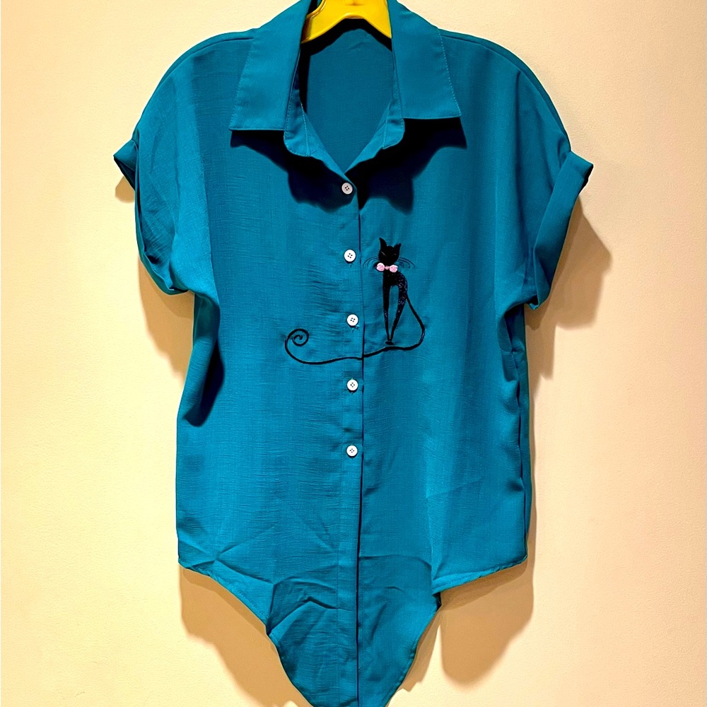 Short sleeve blouse with embroidered black cat. Never worn